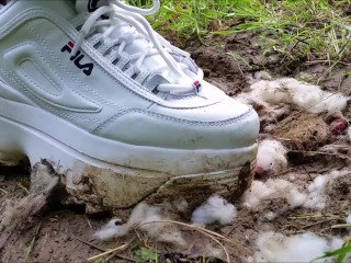 Stomping Doll in the Ground with Fila Disruptor Platform